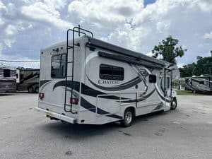 2014 Thor Chateau 28Z Class C RV in a dealership lot.