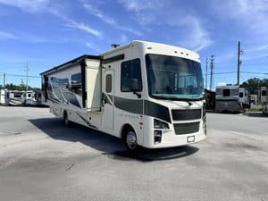 2023 Coachmen Mirada 35OS motorhome in a dealership lot.