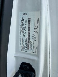VIN label on 2014 Thor Chateau 28Z RV for vehicle identification.
