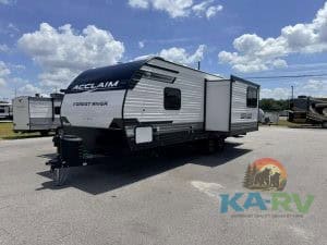 2026 Acclaim 2500RD RV parked outdoors with blue sky and clouds.