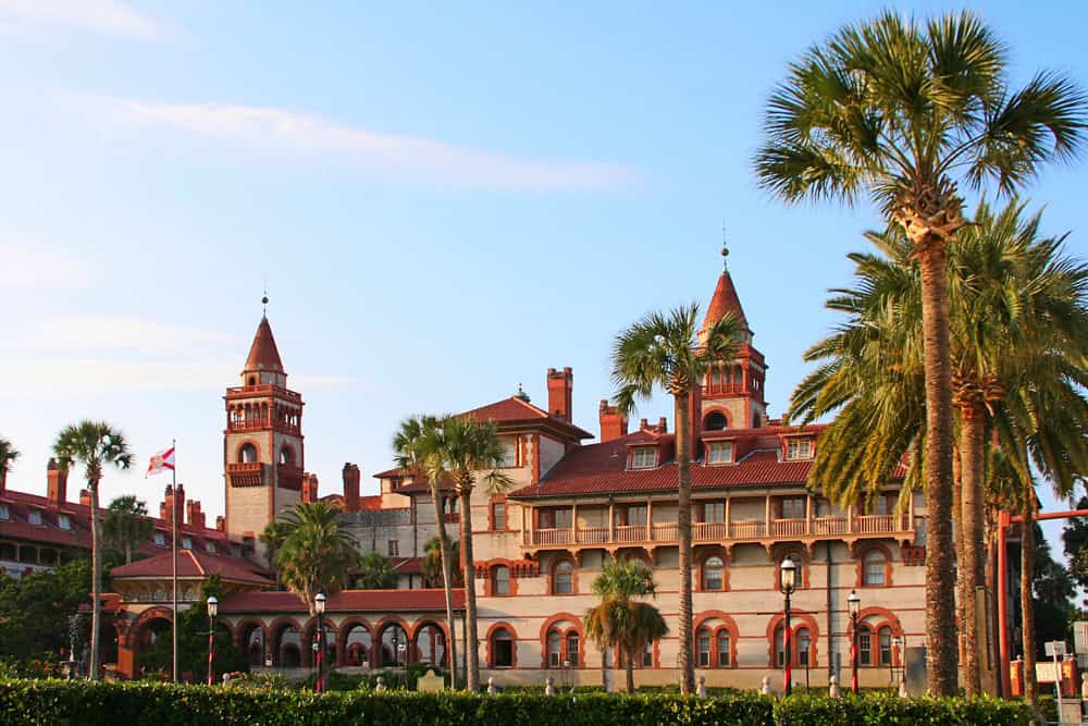Beautiful historic hotel surrounded by palm trees, perfect for fall RV trips in the Southeast.