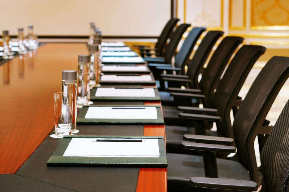 Detailed shot of board room prepped for meeting