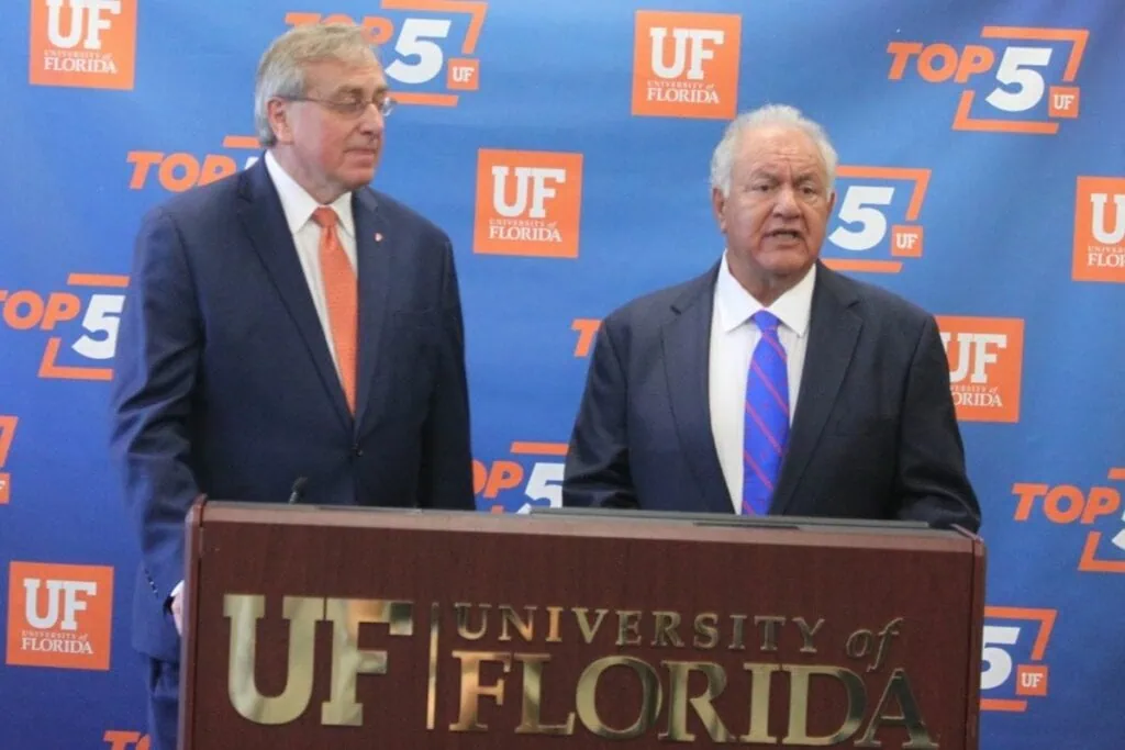 UF Board of Trustees Chairman Morteza Hosseini (right) announced the 13 advisors who will assist in the UF Presidential Search Committee to replacing outgoing Kent Fuchs (left). (file photo)