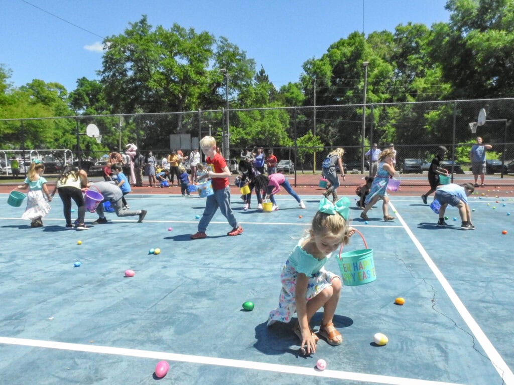 Kids gather Easter eggs at the annual High Springs hunt.