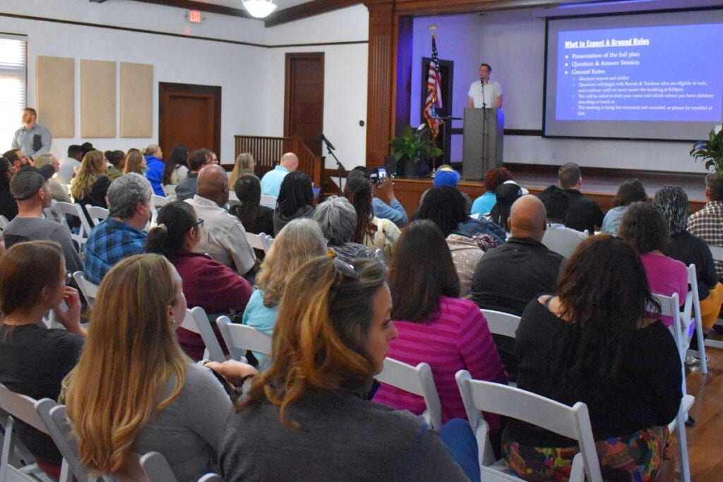 Newberry and Archer citizens filled the Newberry municipal building to hear their charter school questions answered.