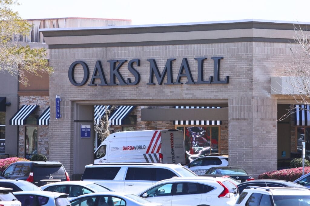 Oaks Mall sign on building in Gainesville