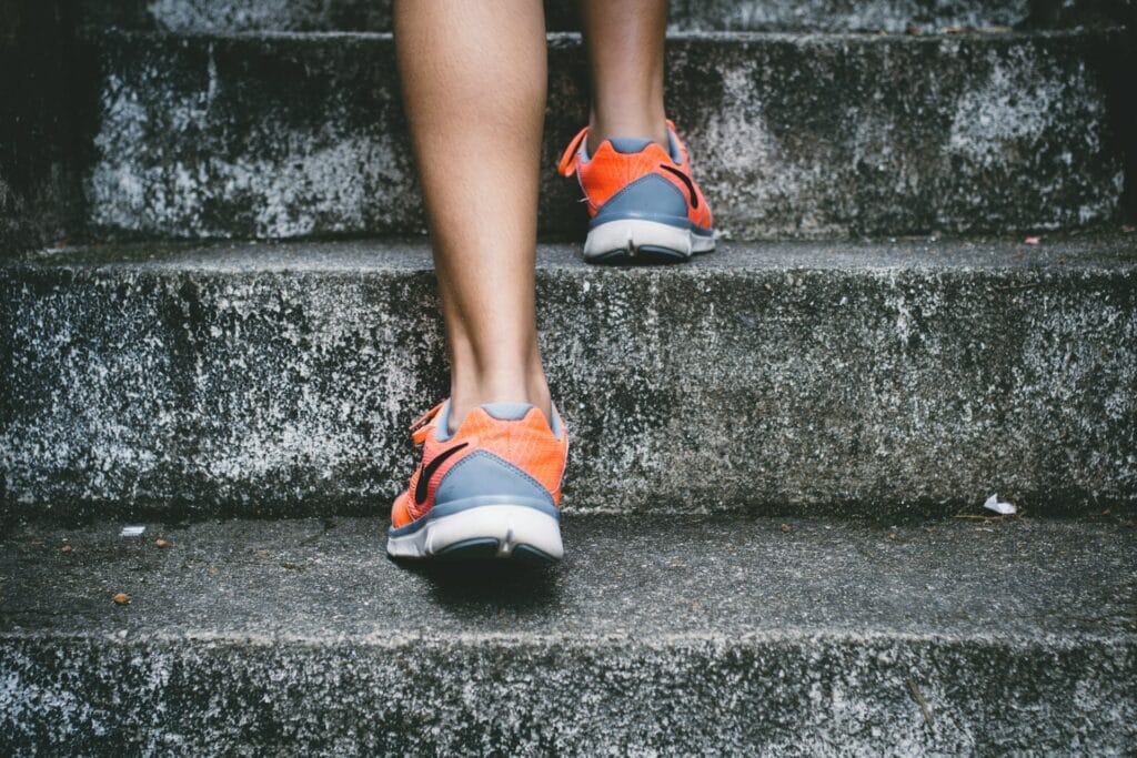 Person runs up stairs.