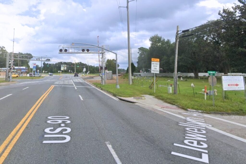 A 73-year-old Tampa woman died when her SUV traveled off US 90 east of Lake City on Tuesday morning and struck a railroad gate mechanism.