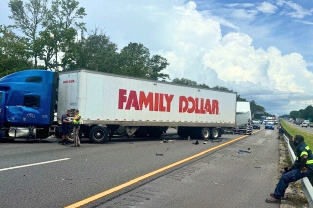 Three tractor-trailers collided on I-75 in Gainesville near the Newberry Road exit Thursday morning and stopped all three southbound lanes.