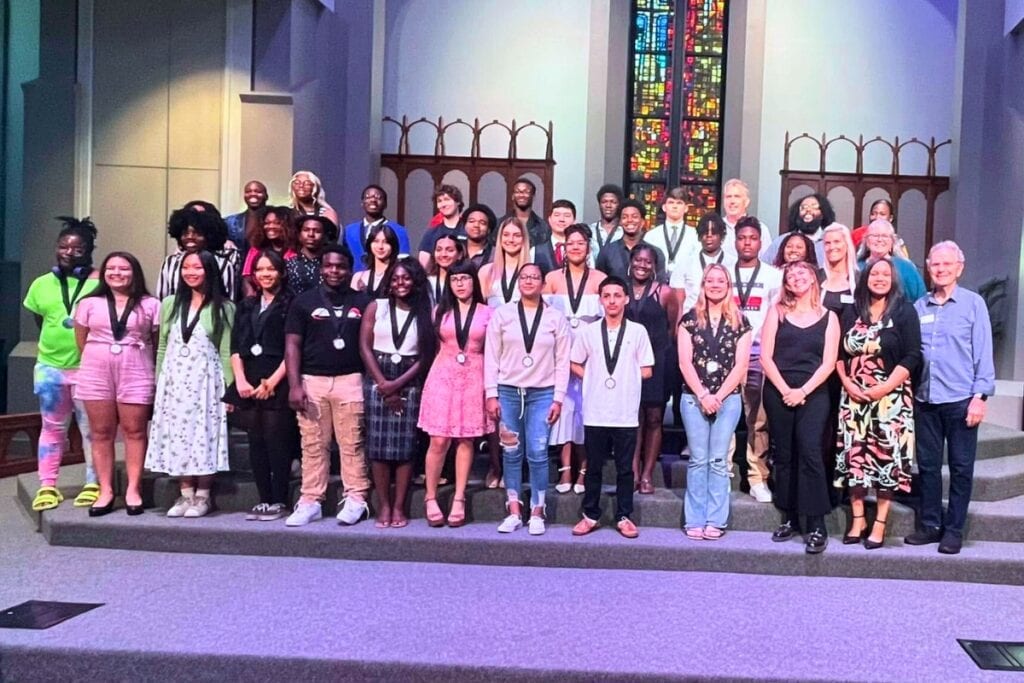 The Education Foundation of Alachua County staff and board with the Class of 2024 Senior Scholarship and Take Stock in Children award recipients.