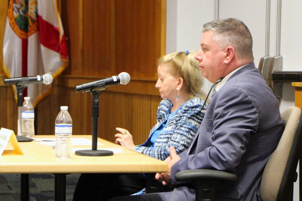 City Attorney Marian Rush and City Manager Mike DaRoza at Monday's Alachua City Commission meeting. Photo by Lillian Hamman