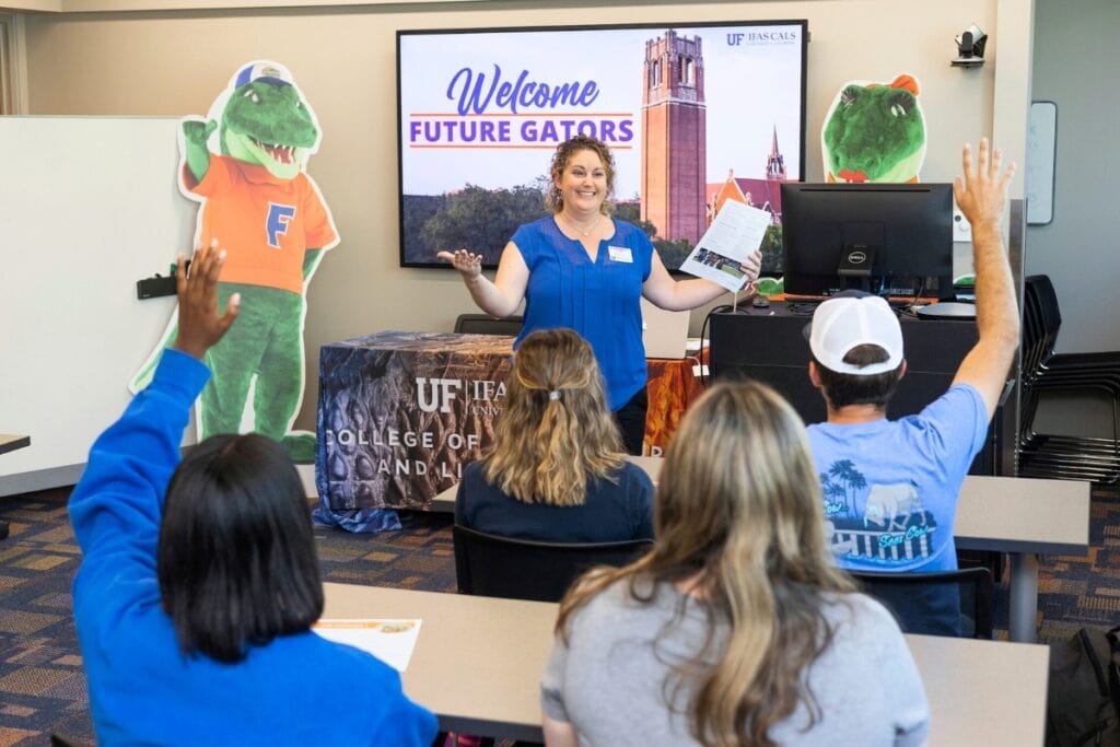 College of Agricultural and Life Sciences (CALS) Academic Advisor Kathryn Ivey speaks to students during a welcome event in McCarty Hall. Photo by Cat Wofford UFIFAS