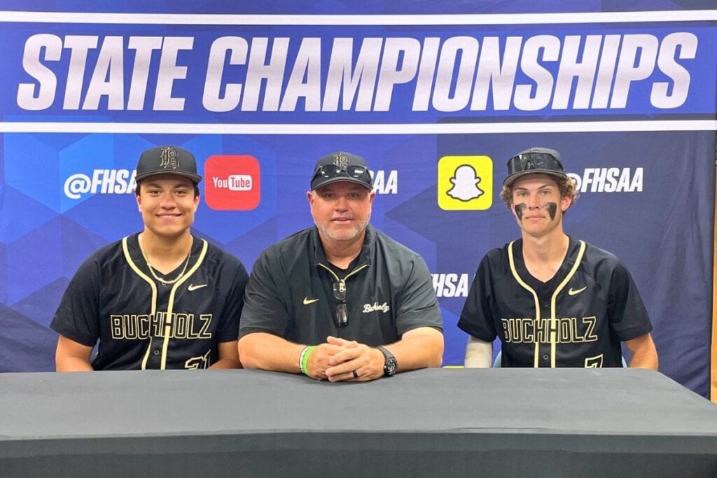 (From left) Buchholz pitcher JJ Gardner, coach Ron Brooks and second baseman Blake Brewer following a 3-0 win over Wharton in the 6A state semifinals on Friday. Photo by Mike Ridaught
