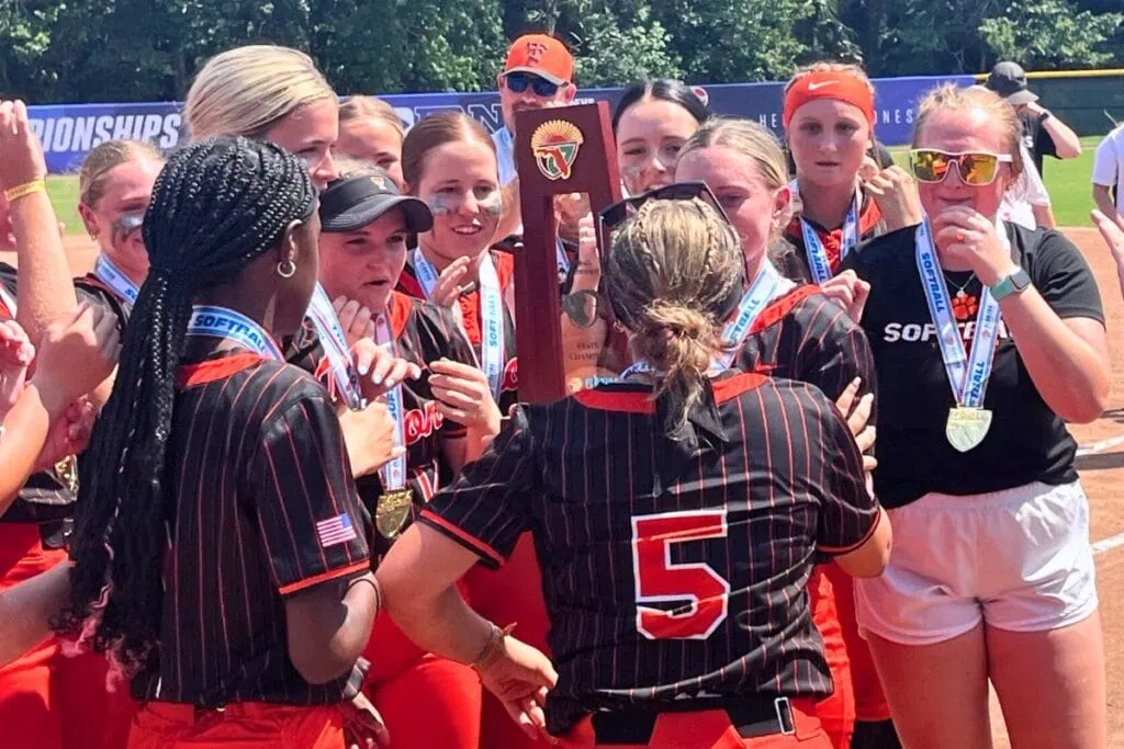 Trenton softball players with the state championship trophy after defeating Northview (Bratt) on Wednesday. Photo by Mike Ridaught
