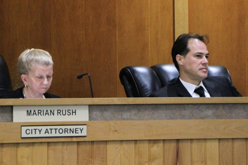 City Attorney Marian Rush and Interim City Manager Rodolfo Valladares hear presentations from the dais during a regular meeting. Photo by Lillian Hamman