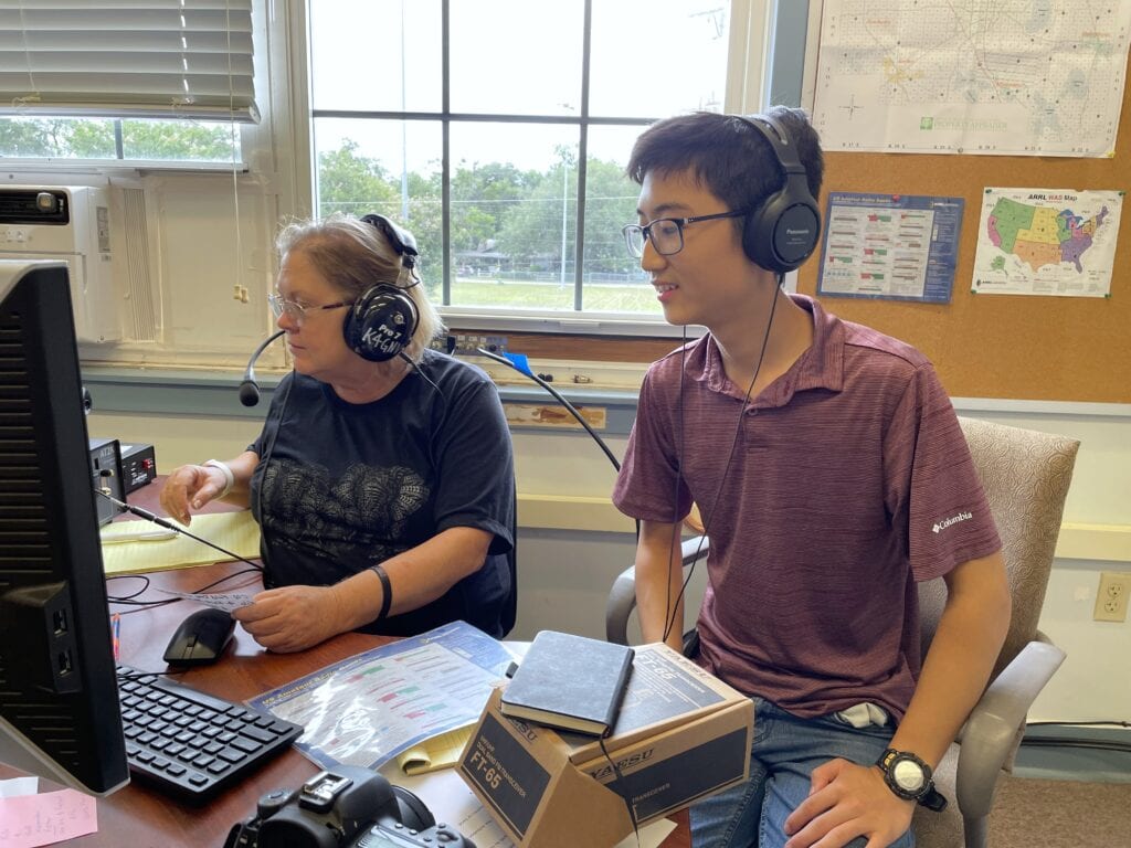 Robert Hu watches at one of GARS' stations during the summer field day. Photo by Seth Johnson