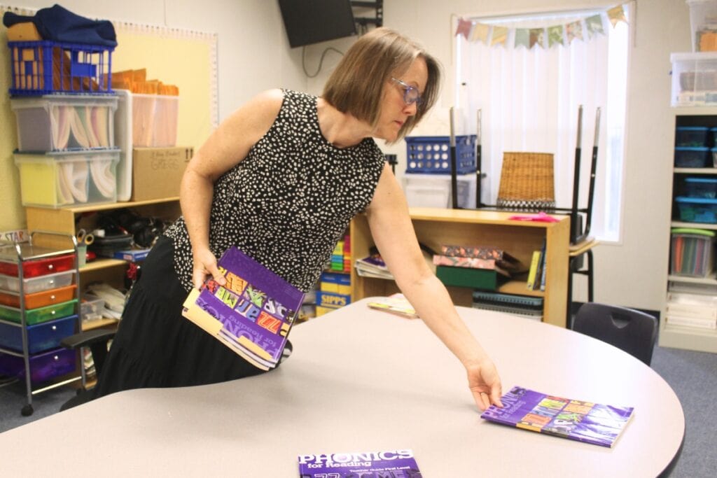 Carolyn Beatrice Parker Elementary School teacher Kim Gregg prepares her classroom for the new school year. Photo by Nick Anschultz