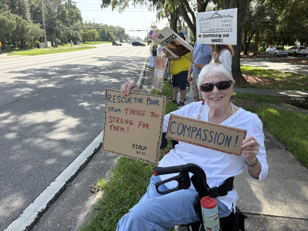 Mary Kilgore of Gainesville, 84, in her first street protest since the Vietnam War.
