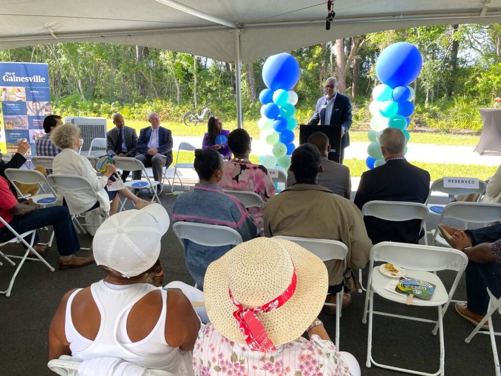 UF Health Senior Vice President Michael Holmes speaks at the ribbon cutting for infrastructure at the city of Gainesville's EHEDI site. Photo by Seth Johnson