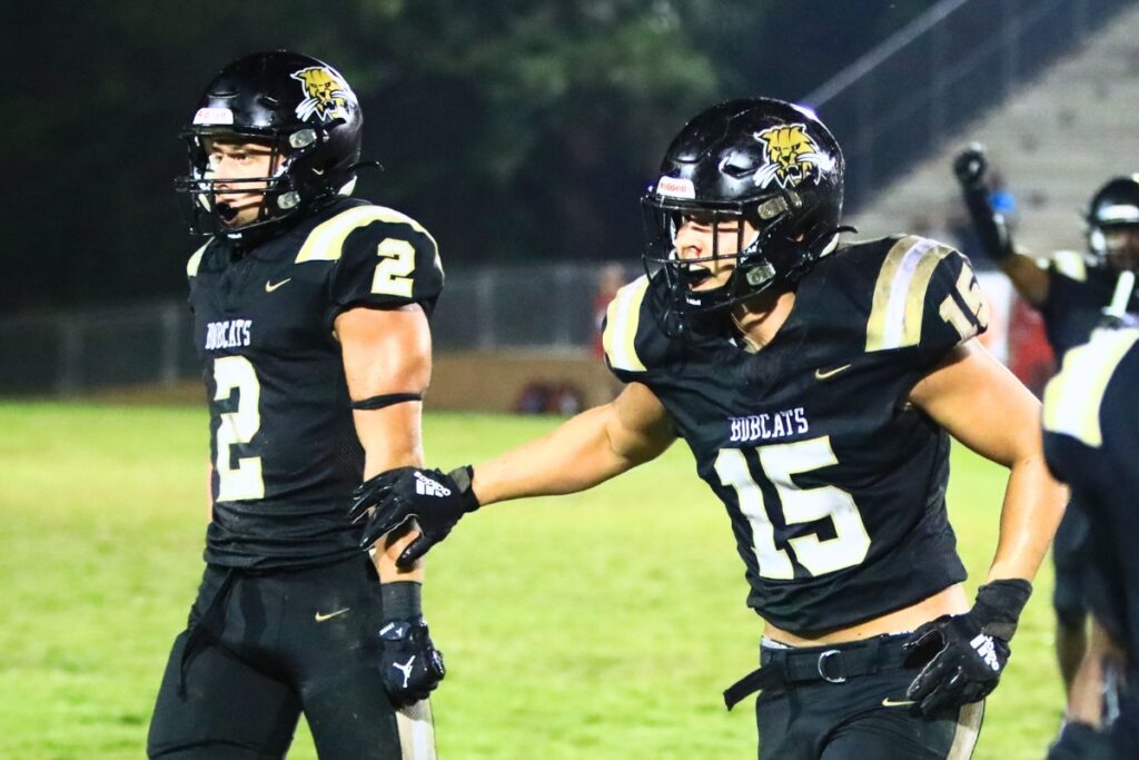 Buchholz's Troy Fleming (0) and Evan Walker (15) led the Bobcats with 10 tackles apiece in a win over Vanguard (Ocala) on Aug. 21. Photo by C.J. Gish