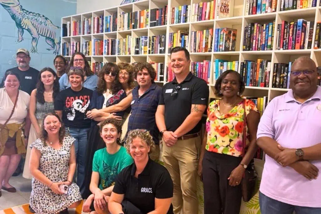 GRACE Marketplace celebrated its new library space on Tuesday with 1,300 books donated via The Lynx bookstore. Courtesy of The Lynx