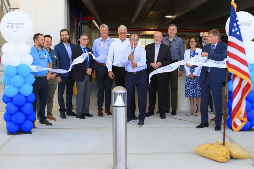 Local leaders cut the ribbon on Gainesville Regional Airport's new parking garage. Photo by Seth Johnson