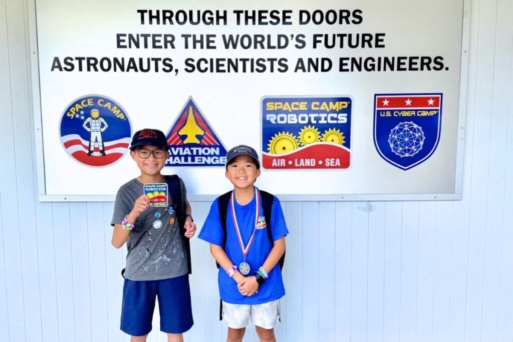 Oak Hall School sixth graders Nico Vu (left) and Nathan Tran recently attended Space Camp Robotics in Huntsville, Alabama, representing the school on Team Gear. Courtesy of Oak Hall School