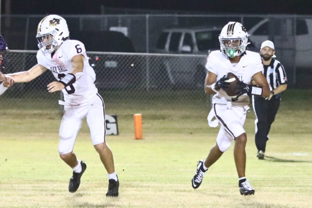 Oak Hall's Aaron Akins (right) will take over full time at quarterback. Photo by C.J. Gish