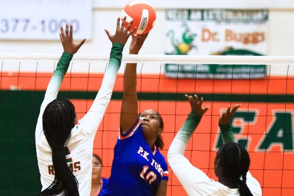 P.K. Yonge's Jada Adderly (10) with a hit againt Eastside's Ciara Brooks (2). Photo by C.J. Gish