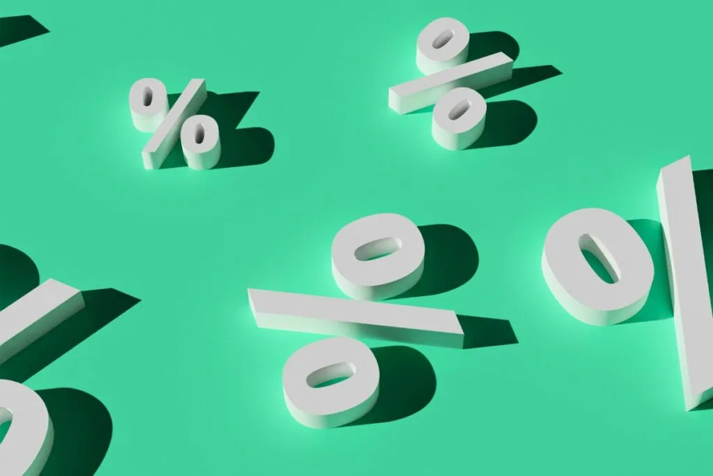 Percent signs interest rates. Photo by Ali Rezaei-unsplash