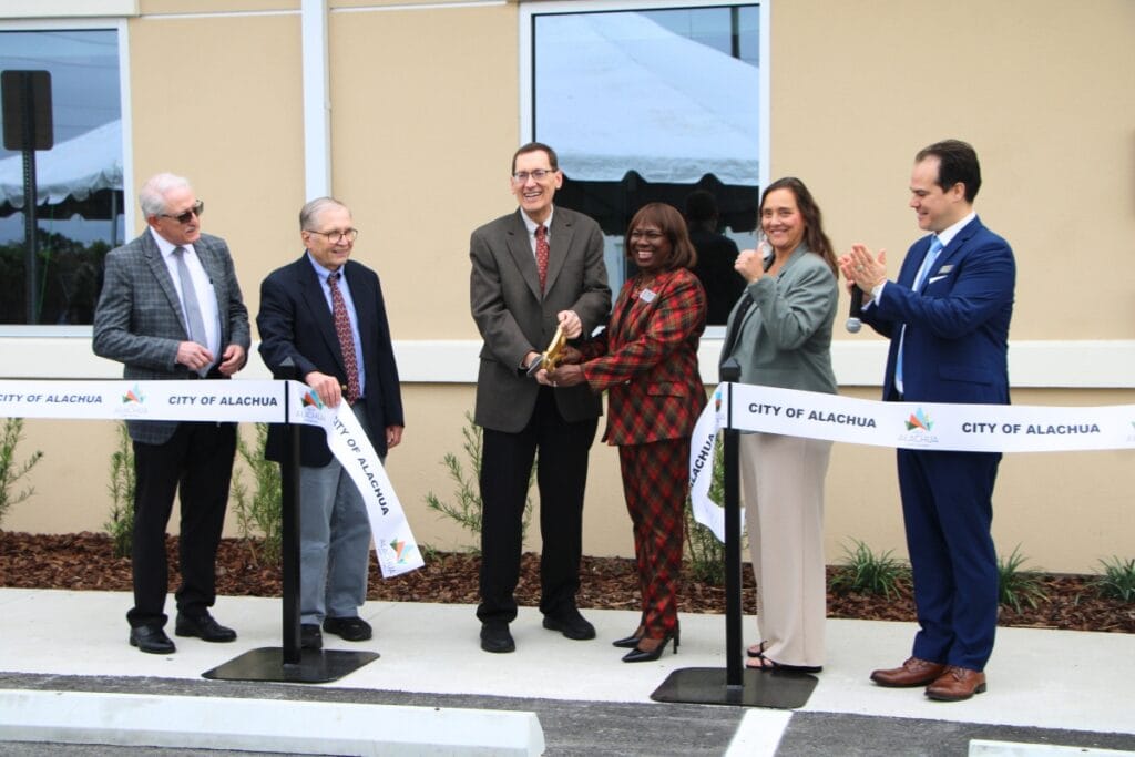 Alachua staff and project supporters cut the ribbon to the city's new water management facility on Wednesday. Photo by Lillian Hamman