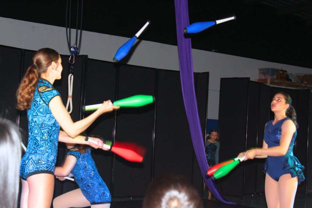 Gainesville Circus Center students kept families engaged with activities such as juggling. Photo by Nick Anschultz
