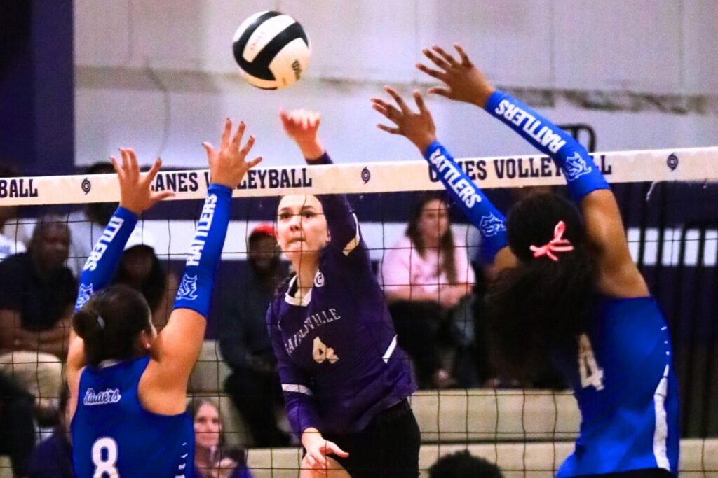 Gainesville's Rowan Kage (4) with a hit against Belleview in the Class 5A-District 5 semifinals. Photo by C.J. Gish