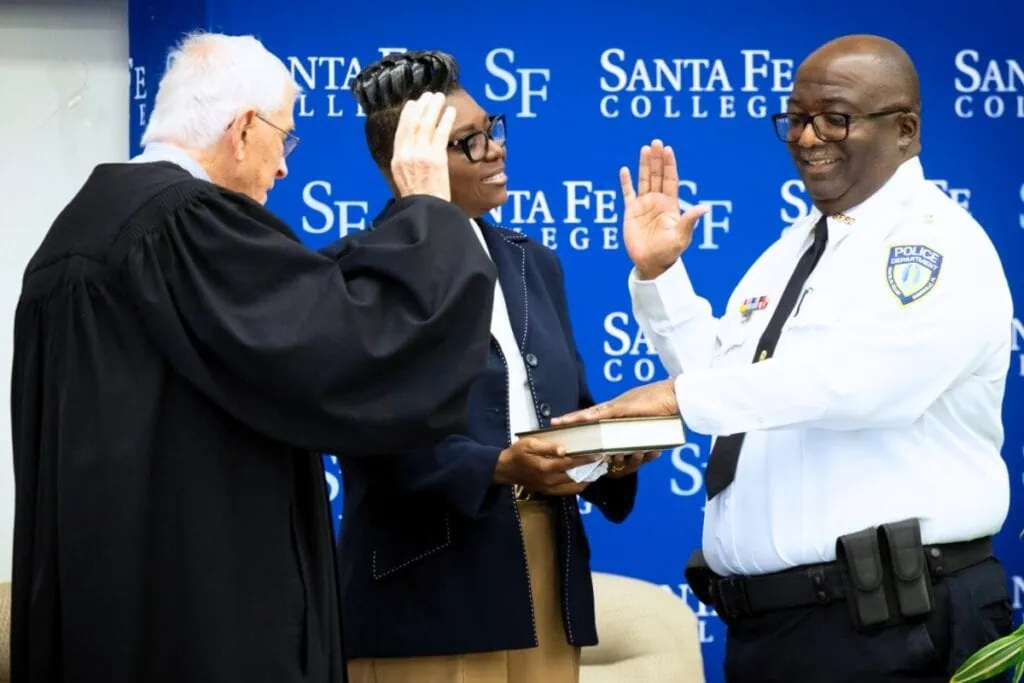 Ryan Woods (right) was recently sworn in as Santa Fe College's new chief of police. Courtesy of SF College