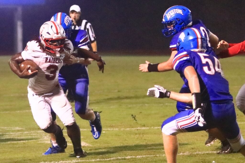 Santa Fe's Jasiah Powell (3) rushed for 166 yards and three touchdowns in the first half against Keystone Heights. Photo by C.J. Gish