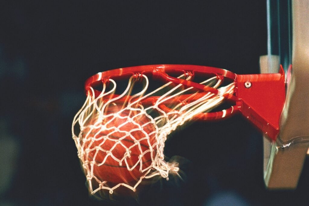 Basketball going through hoop. Metro Creative