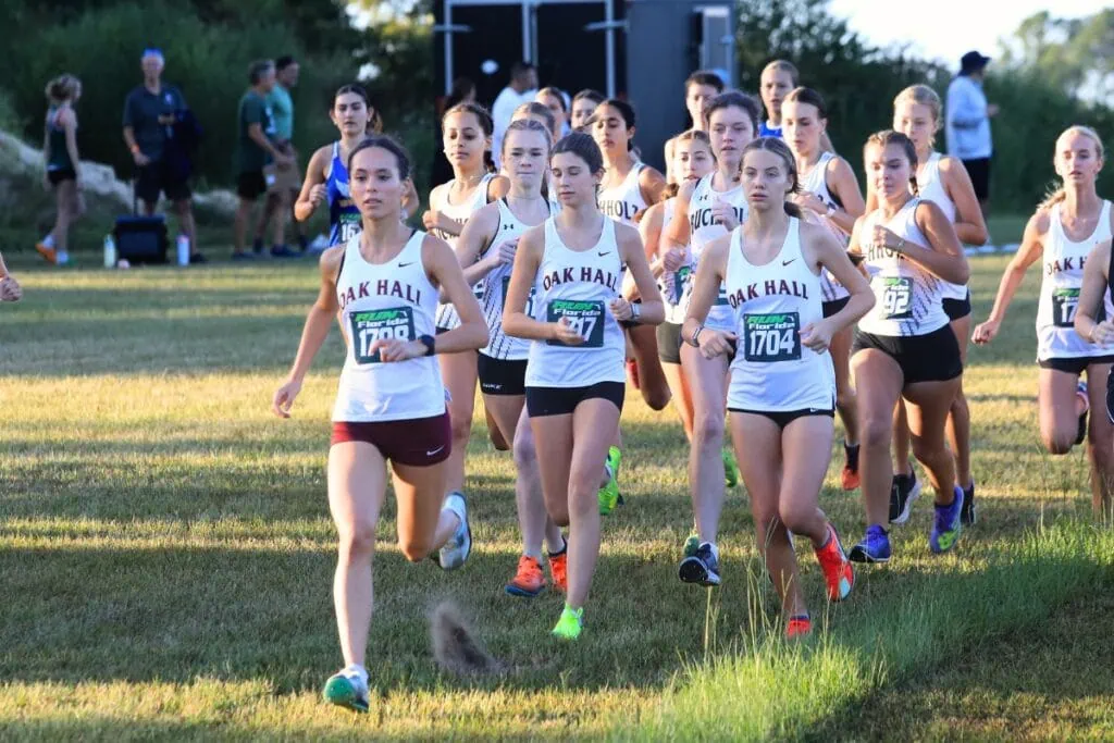 Estella Collante leads the Oak Hall Eagles off the start line for the 2025 Bobcat Classic in Gainesville. Photo by Seth Johnson