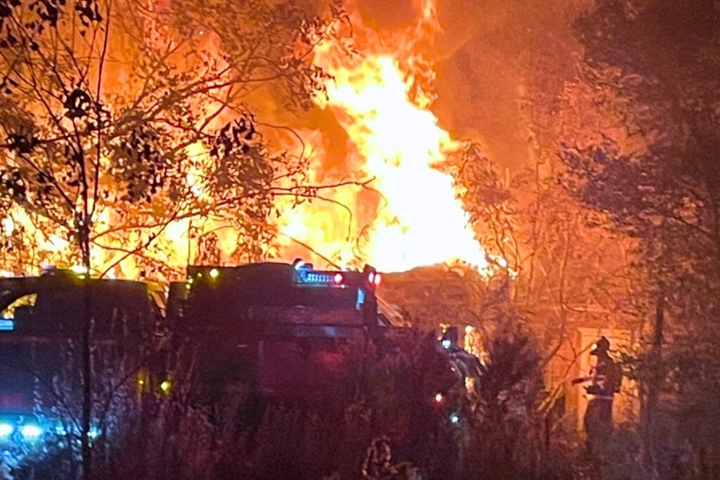 Firefighters from multiple agencies extinguished a fire that consumed a 4,100-square-foot abandoned residential home in High Springs on Sunday evening. Courtesy of HSFD