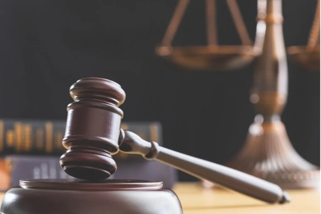 Gavel and justice scale. Metro Creative