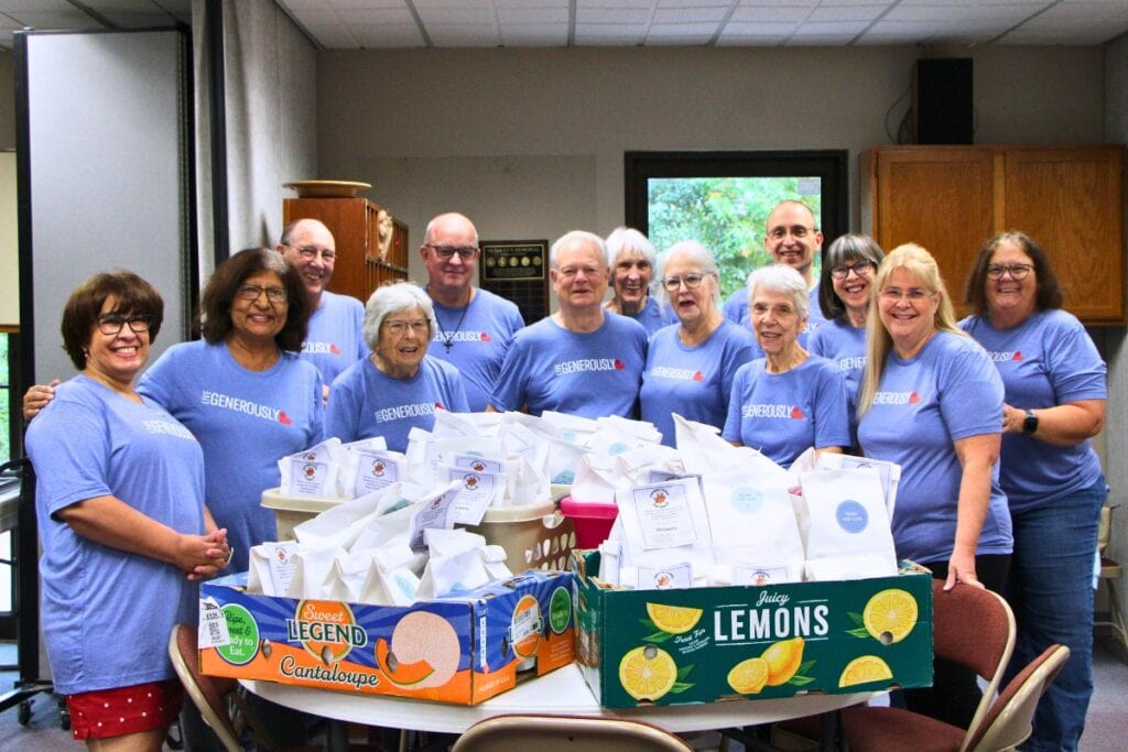 Gethsemane Lutheran Church members and community volunteers packaged 160 lunches for Thanksgiving workers during 'Operation Turkey Sandwich.' Photo by Lillian Hamman
