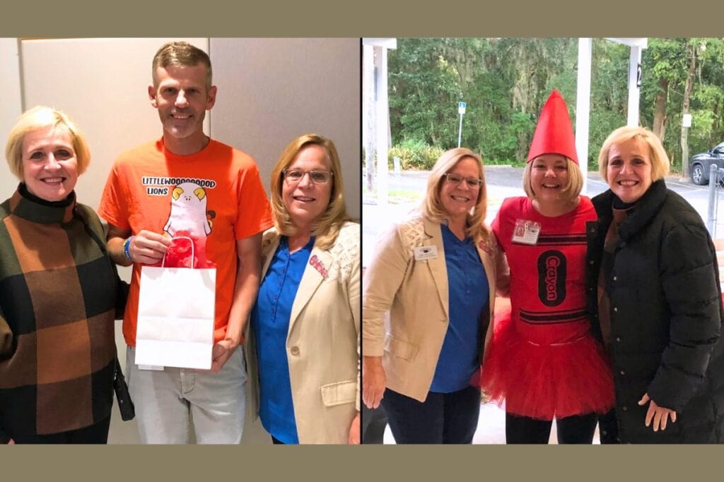 Justin Russell (left, center) was named the Alachua County Public Schools' Principal of the Year while Heather Lowry (right, center) was named the assistant principal of the year. Courtesy of ACPS