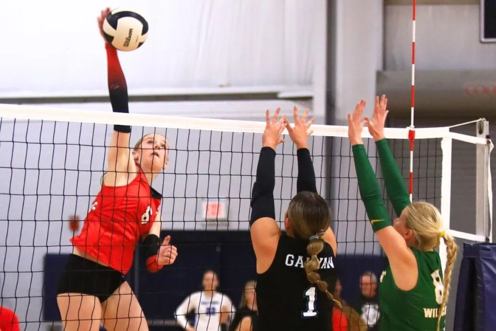 Santa Fe's Delaney Wingenbach (6) with a hit against West Port's Joslynn Galvan (1) and Forest's Mae Owen (8) at The Prep Zone All-Star Showcase. Photo by C.J. Gish