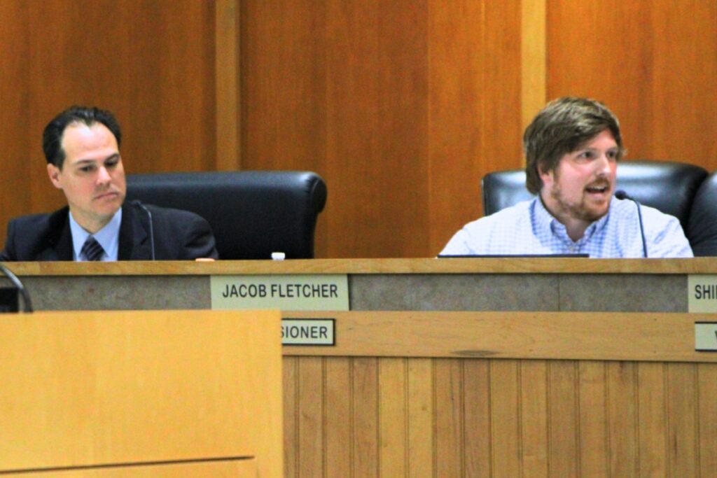 Alachua Commissioner Jacob Fletcher (right) requested a workshop to discuss the city's public records request policy. Photo by Lillian Hamman