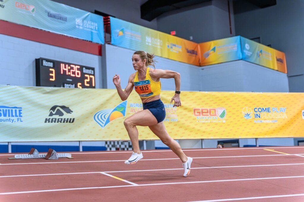 Woman running on a track. Alachua County expects 15,000 athletes to participate in the upcoming 2026 indoor track season. Courtesy of Alachua County