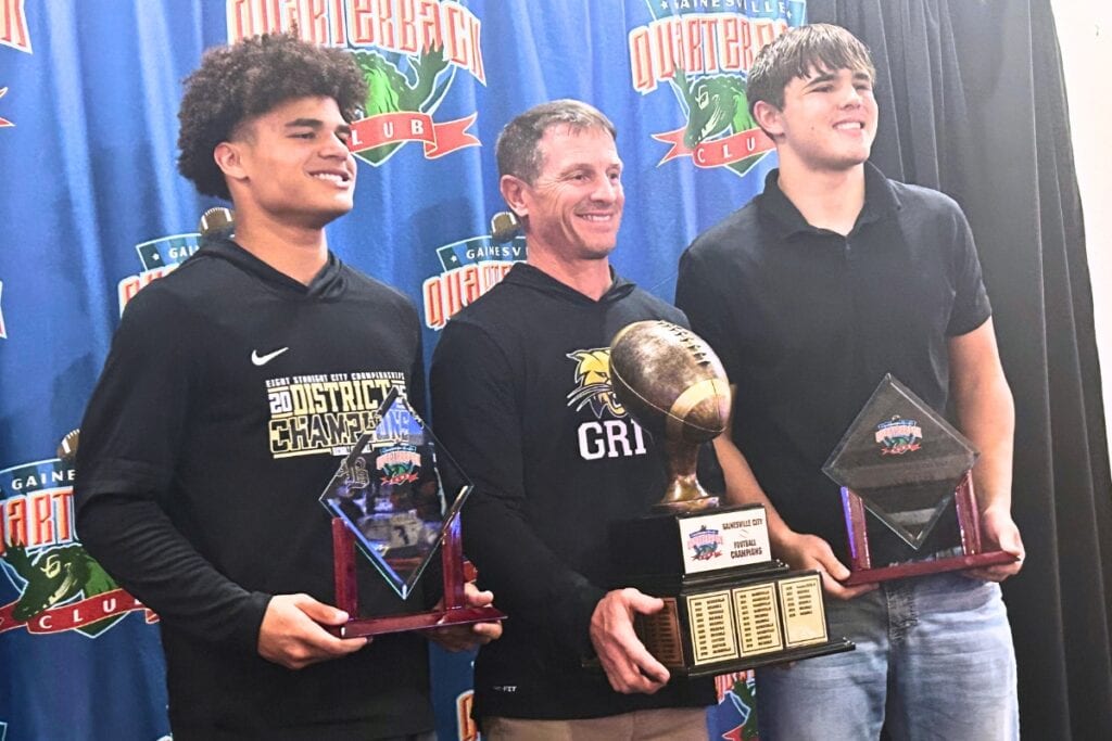 (From left) Buchholz's Justin Williams, Mark Whittemore and Evan Walker were honored at the Gainesville Quarterback Club's annual awards dinner. Photo by Marty Pallman