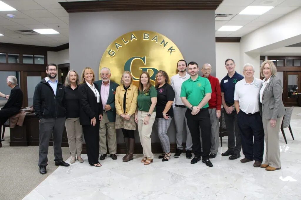 Gala Bank employees celebrate the company's new Gainesville branch.