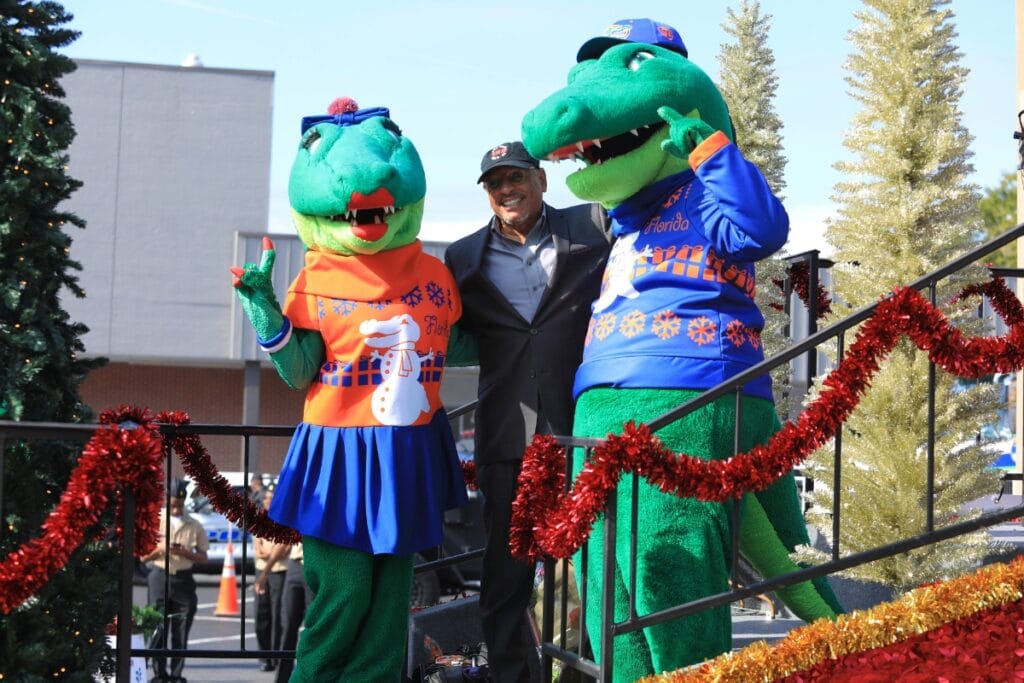 Marion J. Caffey, co-grand marshal for the parade, meets with Albert and Alberta. Photo by Seth Johnson