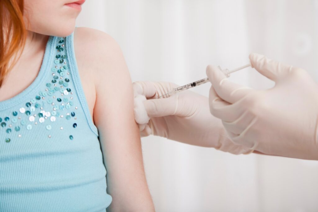 Child being vaccinated. Metro Creative