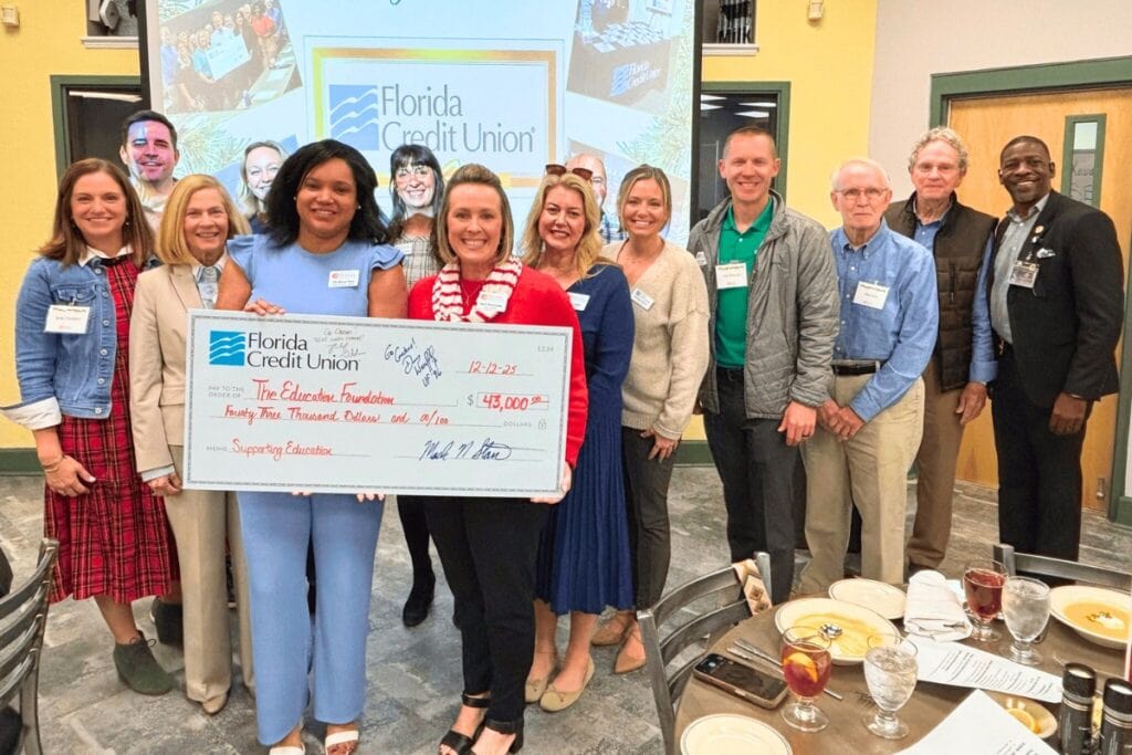 Florida Credit Union presented the Education Foundation of Alachua County with a check for $43,000 during the Education Foundation's annual holiday luncheon in December 2025. Courtesy of FCU