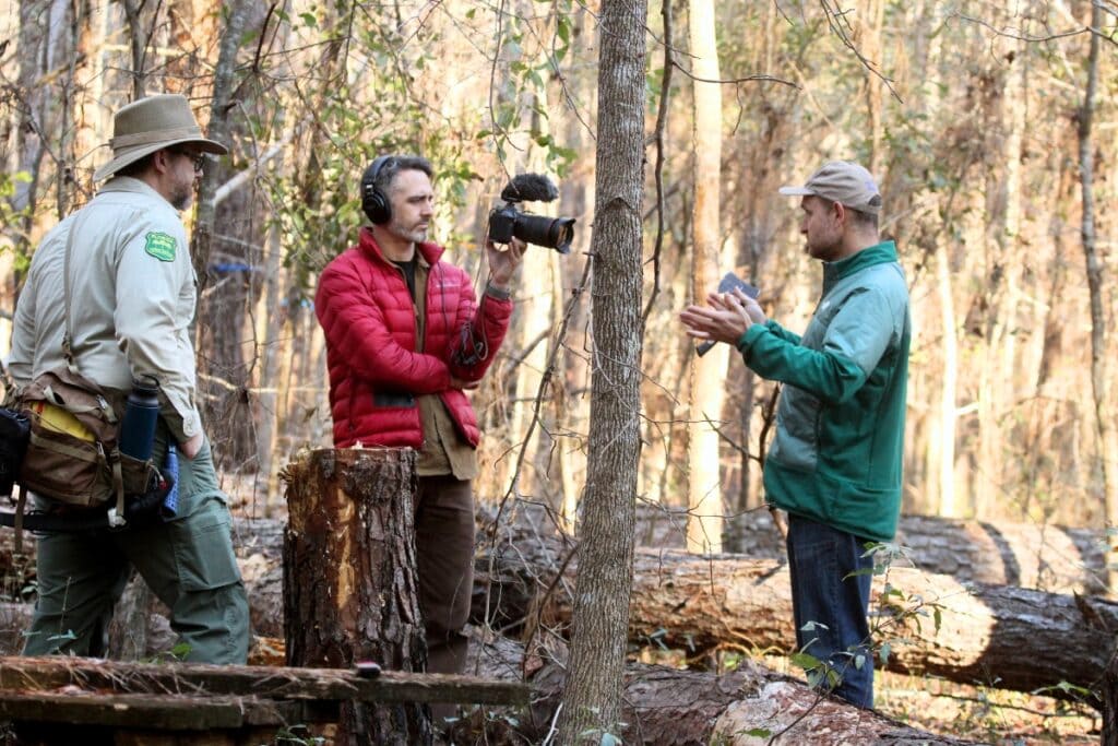 On the set with filmmaker Rob Nelson, UF Professor of Entomology Jiri Hulcr and Florida Forest Service Entomologist Jeff Eickwort at San Felasco Hammock Preserve in Gainesville. Photo by Suzette C